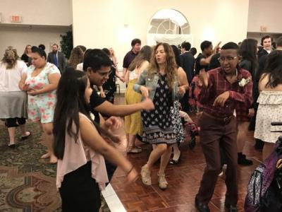Students showing their dance moves on the dance floor